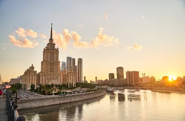 Poster Moscow, Russia - 30.07.2022: View of the Ukraine Hotel, the Moscow City business center and the Moscow River © Dima Anikin