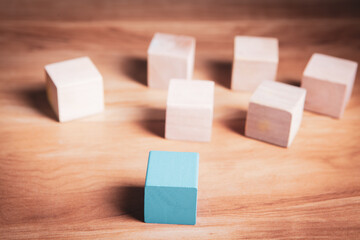 wooden cubes on top of each other