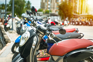 Fototapeta na wymiar Motorbikes parked on the street, Parking area.