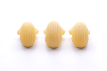 small composition of pasta on a white background