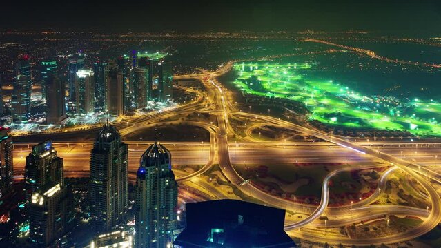 dubai night illumination traffic road junction roof panorama 4k time lapse uae