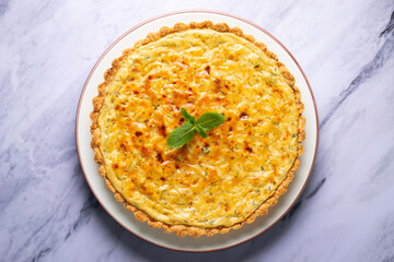 Flaó traditional dessert from Ibiza. The cheesecake is a unique combination of flavors — anise and mint.  The filling is made from fresh cheese (or ricotta and mascarpone), eggs and chopped mint