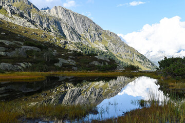 reflection lake in the mountains Göscheneralp