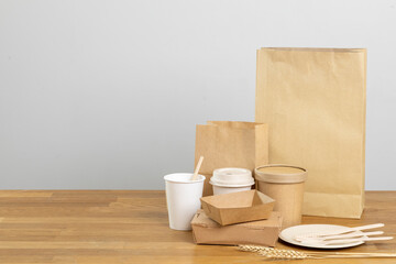 Eco friendly food packaging. Paper recycling zero waste natural products. A box of paper for food disposable catering of nature and recycling concept. Plastic free set on background.