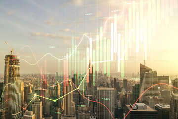 Double exposure of virtual creative financial diagram on New York office buildings background, banking and accounting concept