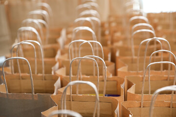 Many open shopping bags. Lots of craft packages. Business concept.