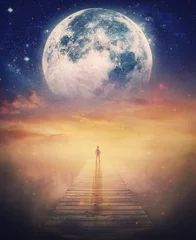 Fotobehang Super moon approaches the Earth, surreal scene and a lone man on the pier watching the fabulous cosmic phenomenon. Mysterious space wonder, fantastic adventure concept. Beautiful twilight scenery © psychoshadow