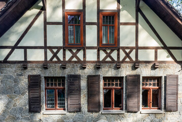 Fototapeta na wymiar windows on an old prussian wall house