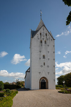 the tall tower of Br&oslash;ns church in jutland