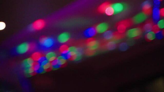 Nightlife Party Lights Flashing Out Of Focus In Dark Club, 4K Slow Motion