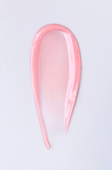 cosmetic smear of balm mask gel on light gray background