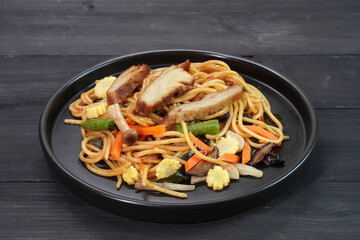 Spaghetti. Thai style spicy vegetarian spaghetti (Pad Khee Mao or Drunken stir fried). Vegetarian food. Vegetarian festival. Italian - Thai fusion food