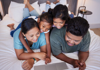 Happy, laptop and relax family in bed streaming subscription comedy movie, funny video or online...