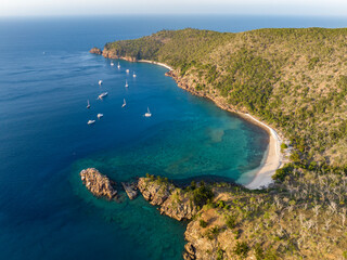 Evening aerial high angle drone view of Blue Pearl Bay on Hayman Island, the most northerly of the...