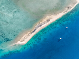 High angle aerial drone view of Langford Island's sandspit or sandbar, a small islet near Hayman...