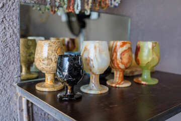 Natural Onyx. Glasses from a natural stone of handwork. Background with selective focus and copy space