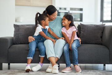 Family, love and single mother with kids looking happy, relax and smiling sitting together and...