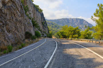 Mountain road near the sea coast. Background with copy space