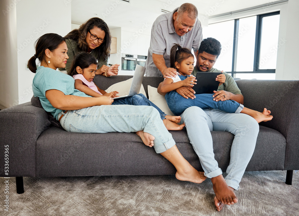 Wall mural Family, children and technology with a kids, grandparents and parents streaming in the living room. Girl, sister and senior relatives watching an online subscription service together in their home