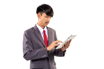 Asian male student wearing gray suit using tablet computer isolated on white background.