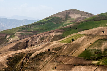 Fields and mountains in the north of Afghanistan near Faizabad city