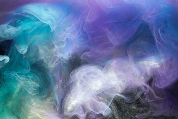 Purple lilac multicolored smoke abstract background, acrylic paint underwater explosion