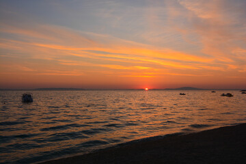 Fototapeta na wymiar tramonto sul mare a Novaljia isola di pag croazia