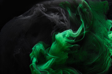 Black green smoke abstract background, acrylic paint underwater explosion, swirling ink