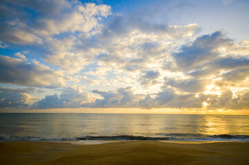 Fototapeta na wymiar Sunrise scenery at the beach