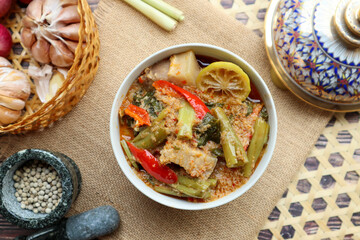Thai Red curry with morning glory and pork belly - Authentic Thai food called Kang Tay po or Geang Tay po 