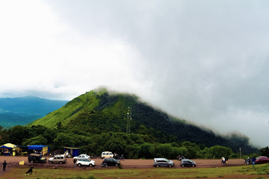Spectacular view of Mullayanagiri peak covered with fog in Chikmagalur,Karnataka,India