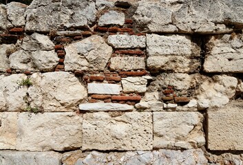 Texture of ancient stone wall at Acropolis, Athens, Greece