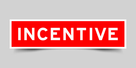 Sticker label with word incentive in red color on gray background