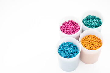 Plastic granules close up for holding,Colorful Plastic granules with white background.
