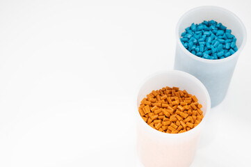 Plastic granules close up for holding,Colorful Plastic granules with white background.
