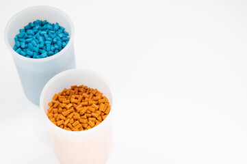 Plastic granules close up for holding,Colorful Plastic granules with white background.