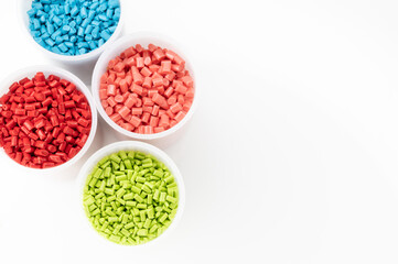 Plastic granules close up for holding,Colorful Plastic granules with white background.