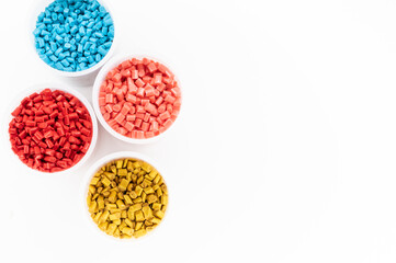 Plastic granules close up for holding,Colorful Plastic granules with white background.