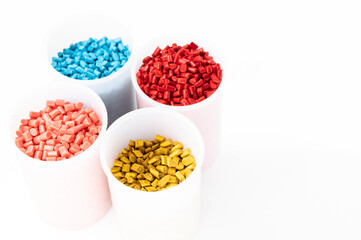 Plastic granules close up for holding,Colorful Plastic granules with white background.