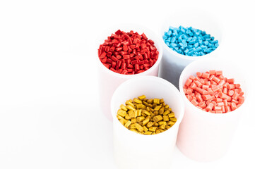 Plastic granules close up for holding,Colorful Plastic granules with white background.
