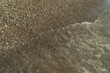 Sea Waves on Pebble Beach