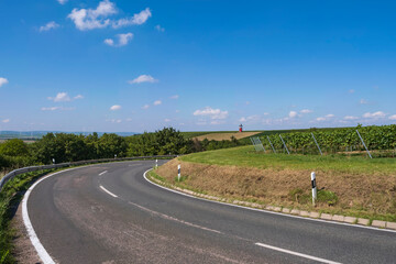 A winding country road through the vineyards near Wörstadt/Germany in Rheinhessen