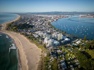 Aerial view of Mount Maunganui with Bay of Plenty and modern buildings, Tauranga, New Zealand