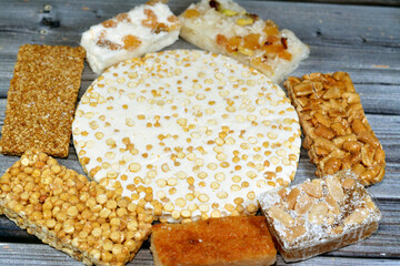 collection of Eastern candy chickpeas, peanuts, sesame taffy, coconut and bassima as a celebration...