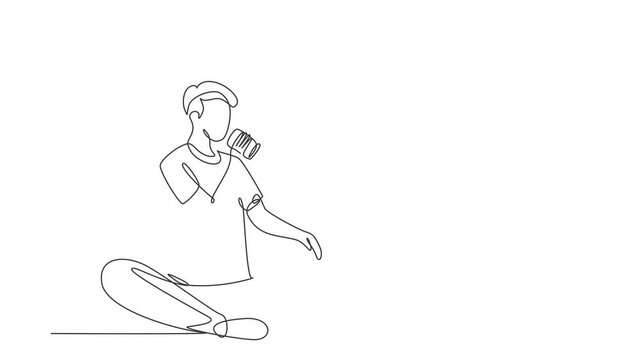 Animated self drawing of single continuous line draw young man sitting while enjoying a soft drink to refreshing and relaxing body. Attractive teenager concept. Full length one line animation.