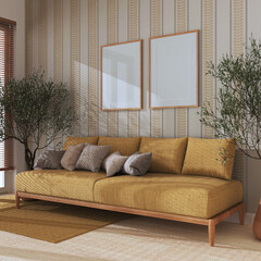 Japandi living room with frame mockup in yellow tones. Fabric sofa with pillows, potted olive trees. Farmhouse interior design