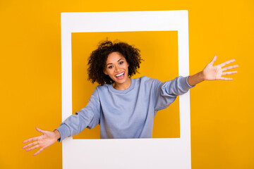 Portrait of attractive excited person raise hands welcome you embrace isolated on yellow color background