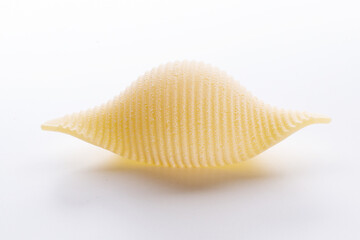 durum wheat pasta on wooden background