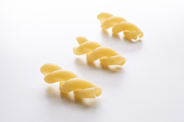 small composition of pasta on white background
