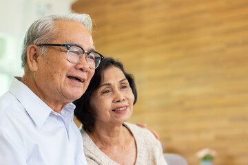 Nursing Home Care concept. elderly couple asian woman are sitting together happily.